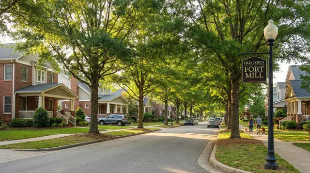 Tree lined street of front porch homes in Old Town Fort Mill, South Carolina
